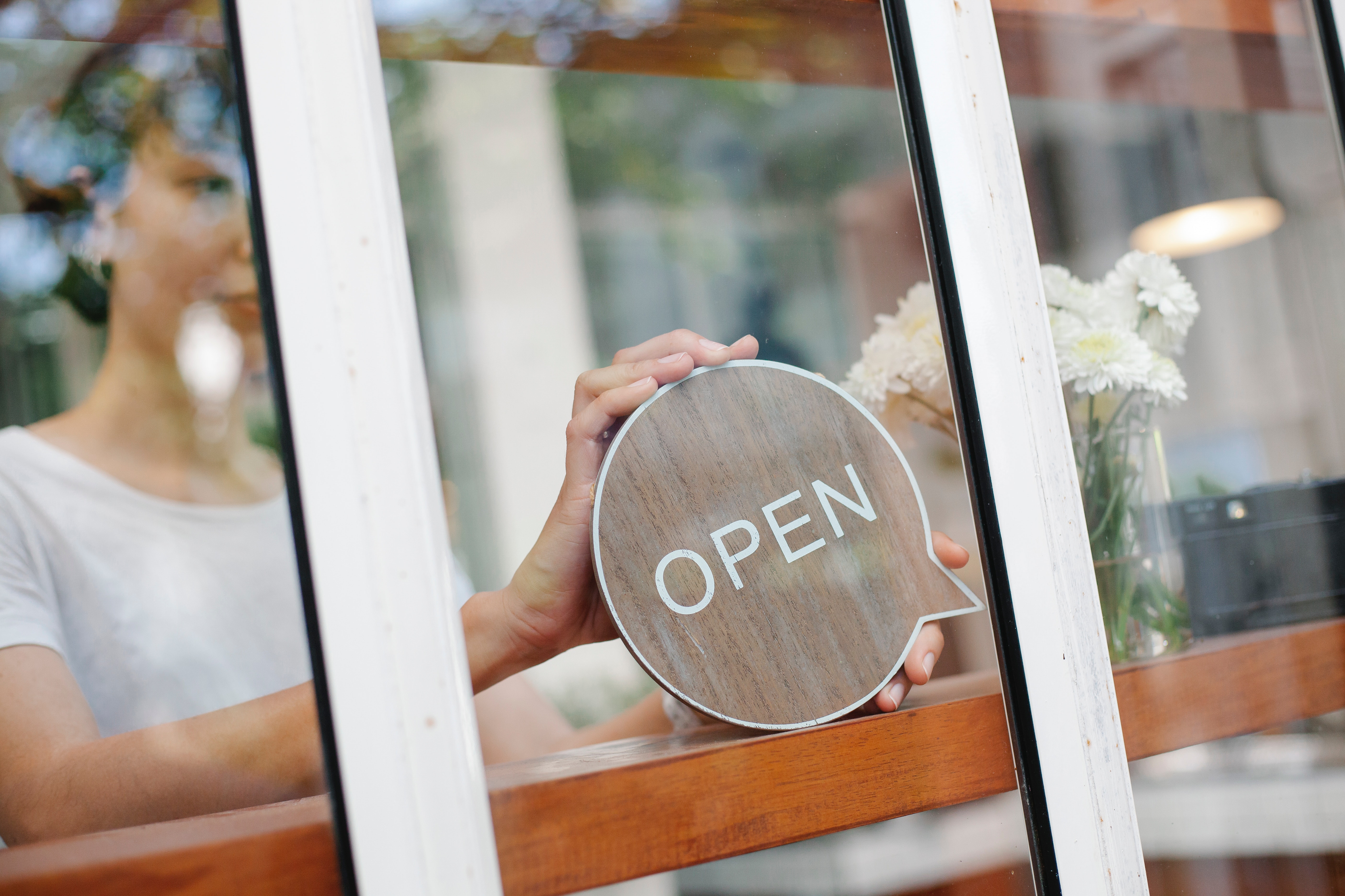 Sign open for business at store front